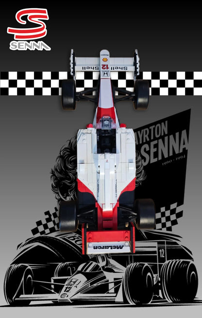 McLaren MP4/4 Ayrton Senna LEGO 10330 – Style Tribute Sombre – Vue de face, fond dégradé gris foncé avec silhouette de la voiture et texte Ayrton Senna 1960-1994 – Tableau mural aluminium Kadris