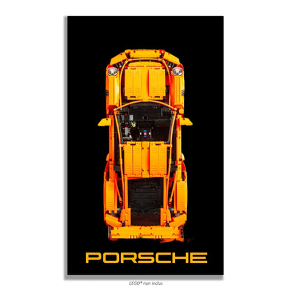 Porsche 911 GT3 RS LEGO 42056 – Style Fond Noir Porsche, finition Cadre aluminium noir – Fond noir uni avec texte PORSCHE en grande typographie orange, sans vis apparentes – Tableau mural aluminium Kadris
