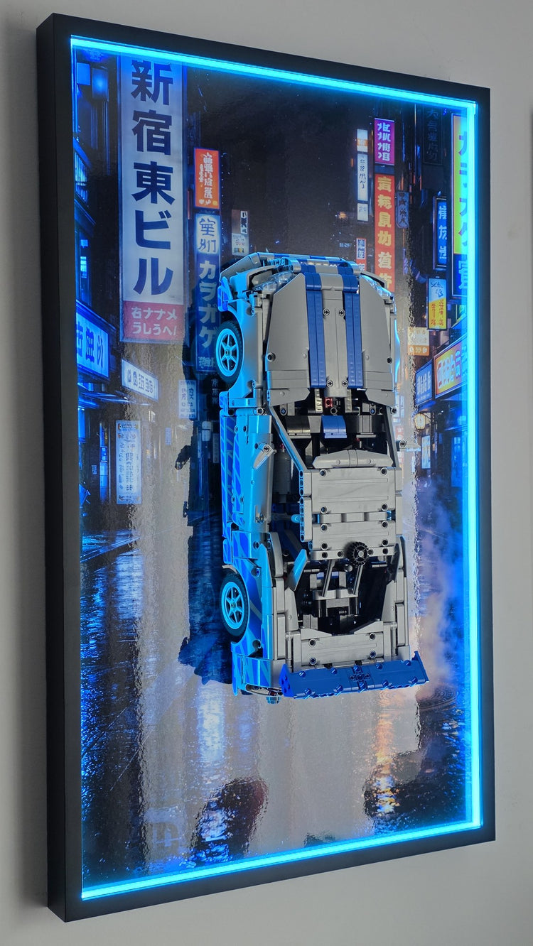 Tableau mural Kadris finition cadre LED avec rétroéclairage bleu, set LEGO Technic fixé sur le tableau